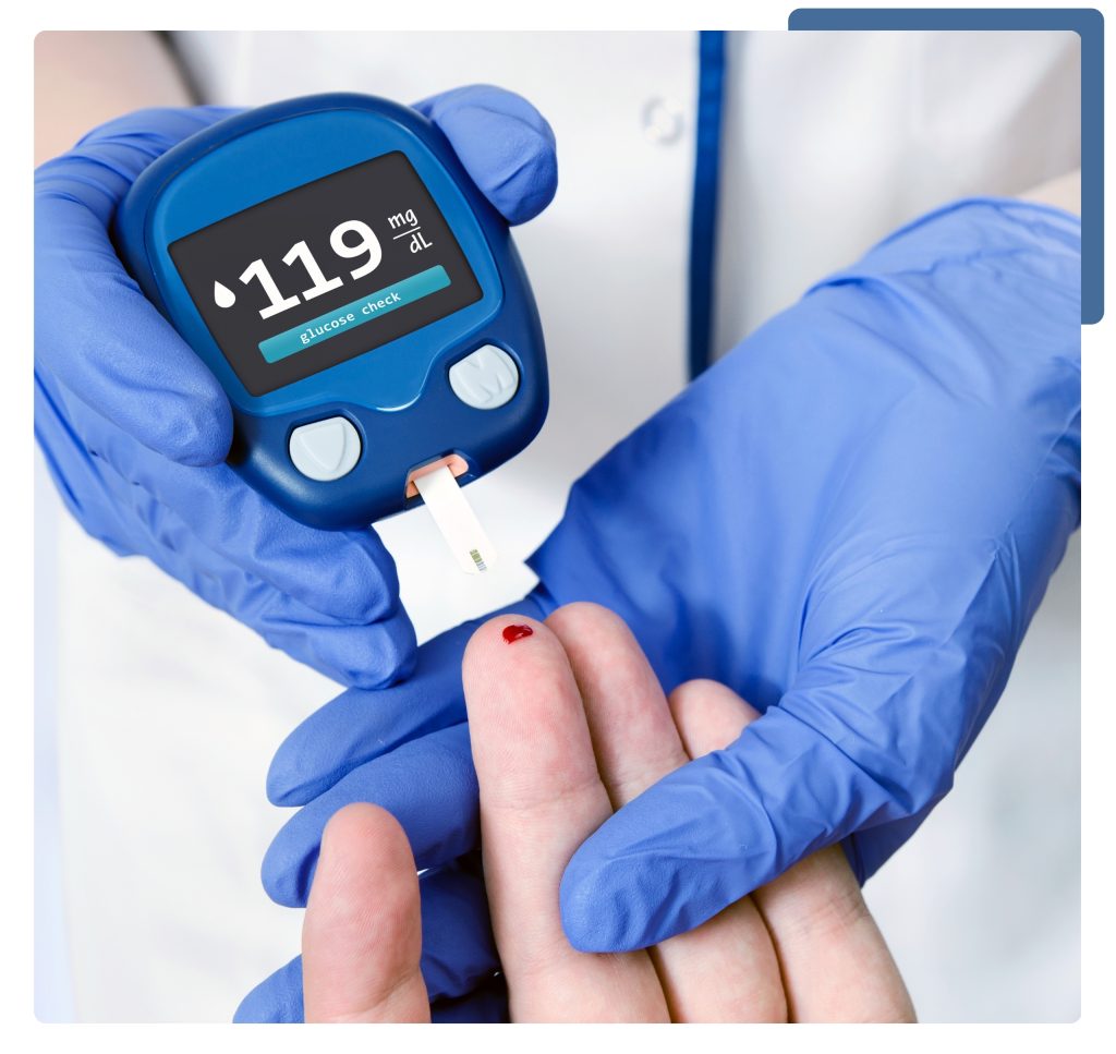 A person in blue gloves holds a blood glucose meter, set against a backdrop of Dubai's skyline.